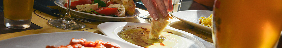 Eating Halal Mediterranean Turkish at Hookah Depot restaurant in Paterson, NJ.